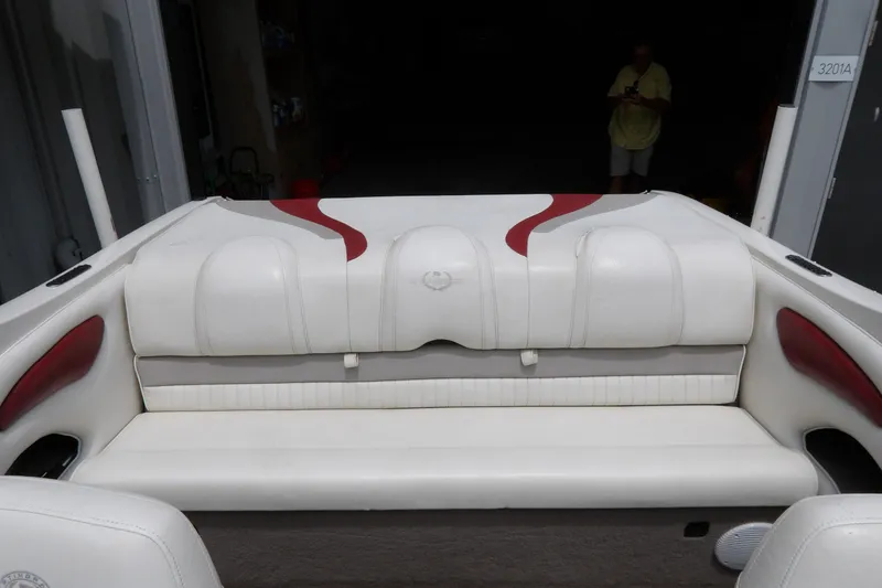 Slide: The Image of 2012 Stingray 195 LS/LX boat interior with white and red seating. - 16