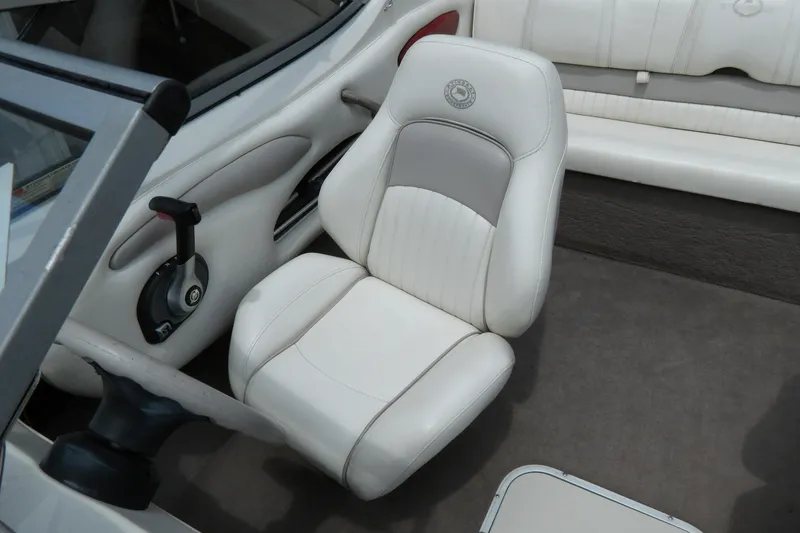 Slide: The Image of 2012 Stingray 195 LS/LX boat interior with white and gray seating. - 15
