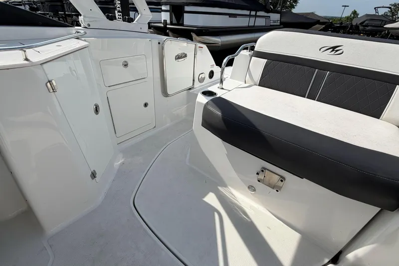 Slide: The Image of 2022 Monterey M4 boat interior with seating and storage compartments. - 34
