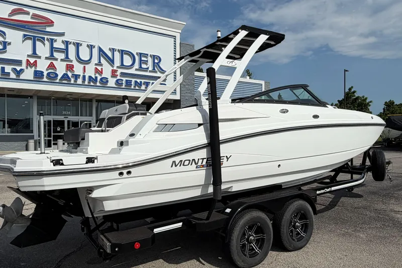 Slide: The Image of 2022 Monterey M4 boat on trailer at Big Thunder Marine dealership. - 37