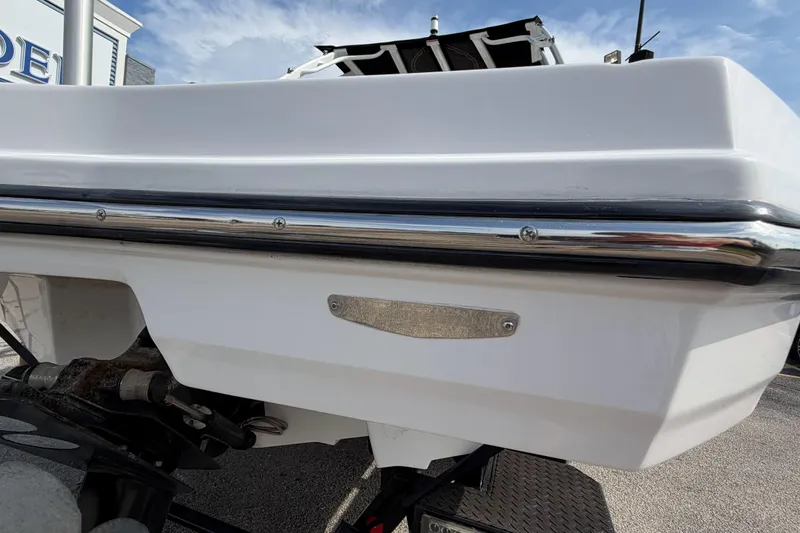 Slide: The Image of Rear view of a 2022 Monterey M4 boat, showcasing sleek design and chrome detailing. - 4