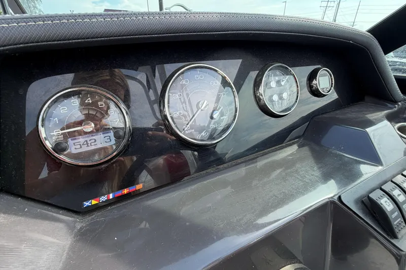 Slide: The Image of Dashboard of 2022 Monterey M4 boat with gauges and controls. - 12