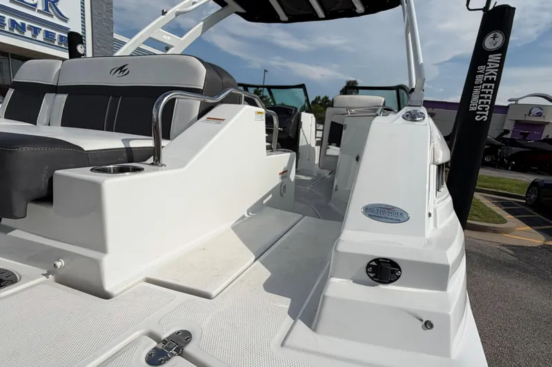Slide: The Image of 2022 Monterey M4 boat with sleek seating and modern design at a dealership. - 17