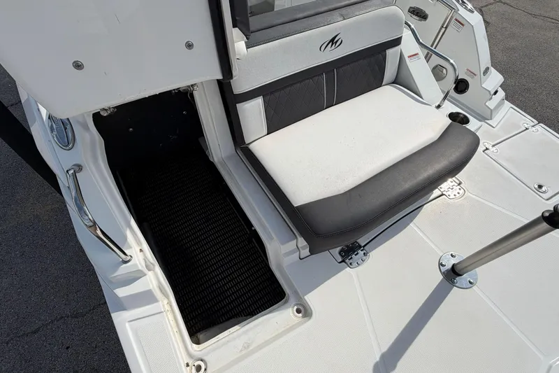 Slide: The Image of 2022 Monterey M4 boat interior with cushioned seating and sleek design. - 18