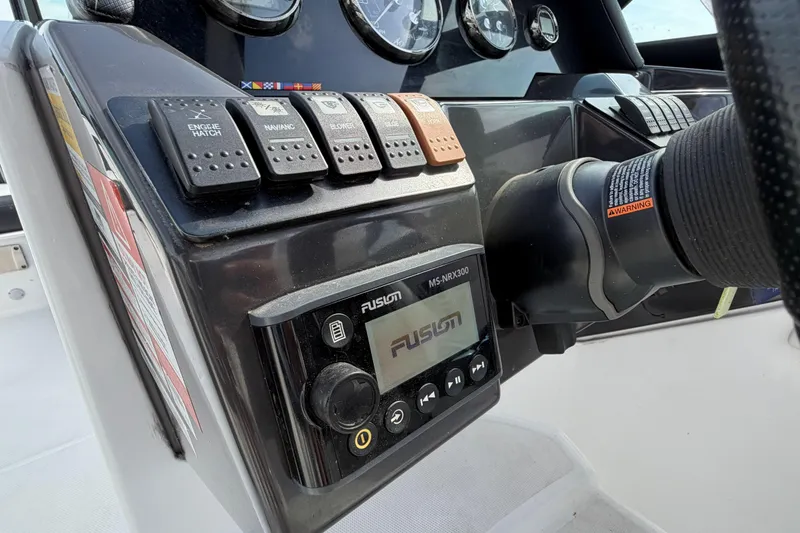 Slide: The Image of Control panel of a 2022 Monterey M4 boat with Fusion audio system. - 11