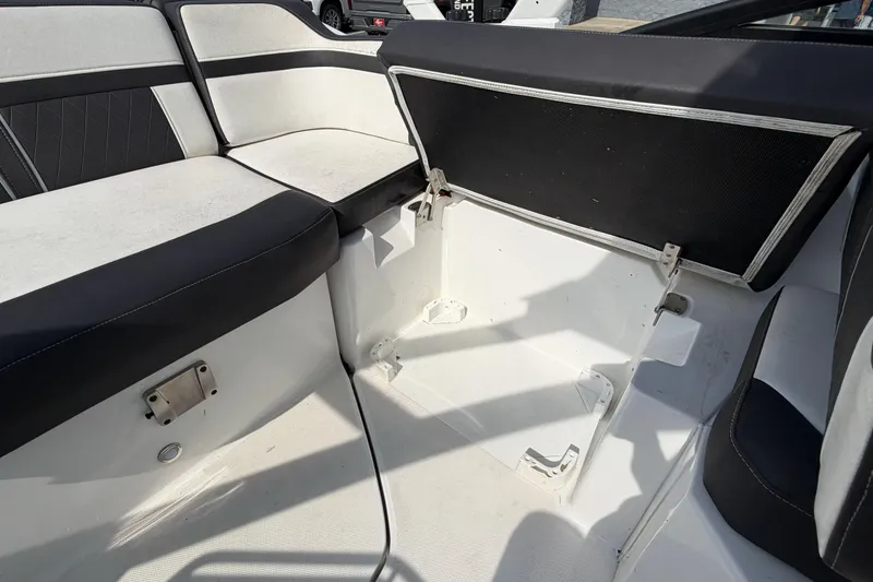 Slide: The Image of Interior seating and storage area of a 2022 Monterey M4 boat. - 16