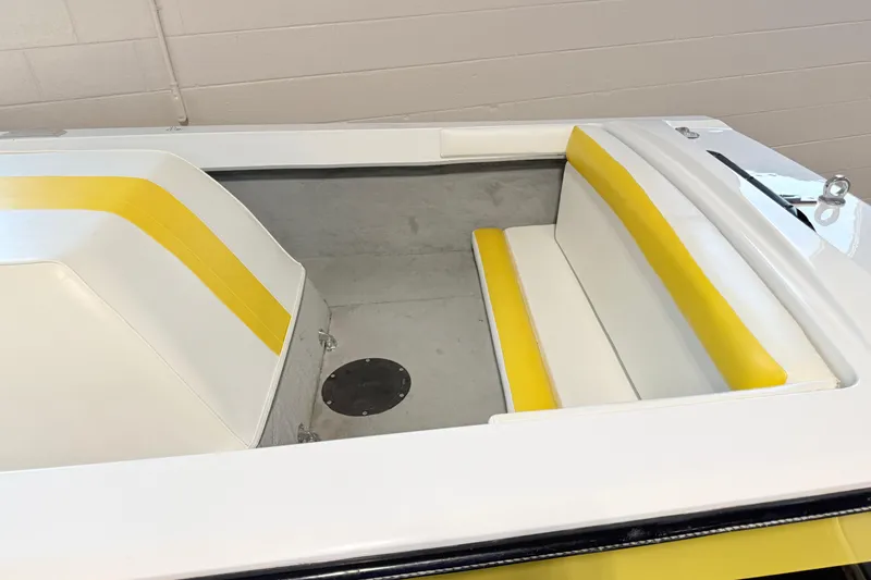 Slide: The Image of 1978 Correct Craft Ski Nautique interior with white and yellow seating. - 9