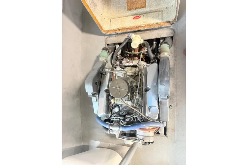 Slide: The Image of 1978 Correct Craft Ski Nautique engine compartment, showcasing detailed mechanical components. - 5