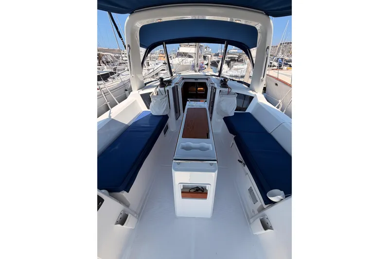 Slide: The Image of Cockpit of 2018 Beneteau Oceanis 35.1 sailboat with blue seating and modern design. - 32