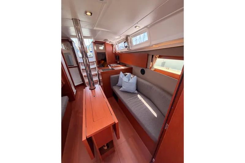 Slide: The Image of Interior of 2018 Beneteau Oceanis 35.1 sailboat, featuring cozy seating and modern design. - 67