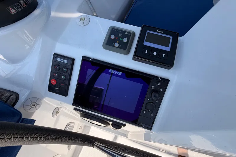 Slide: The Image of Control panel of a 2018 Beneteau Oceanis 35.1 sailboat with navigation instruments. - 28