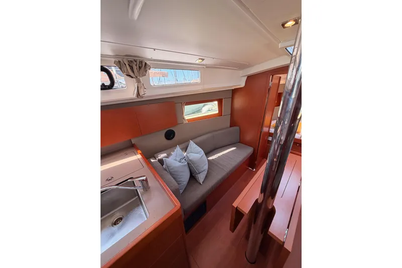 Slide: The Image of Interior of 2018 Beneteau Oceanis 35.1 yacht with cozy seating and modern design. - 56