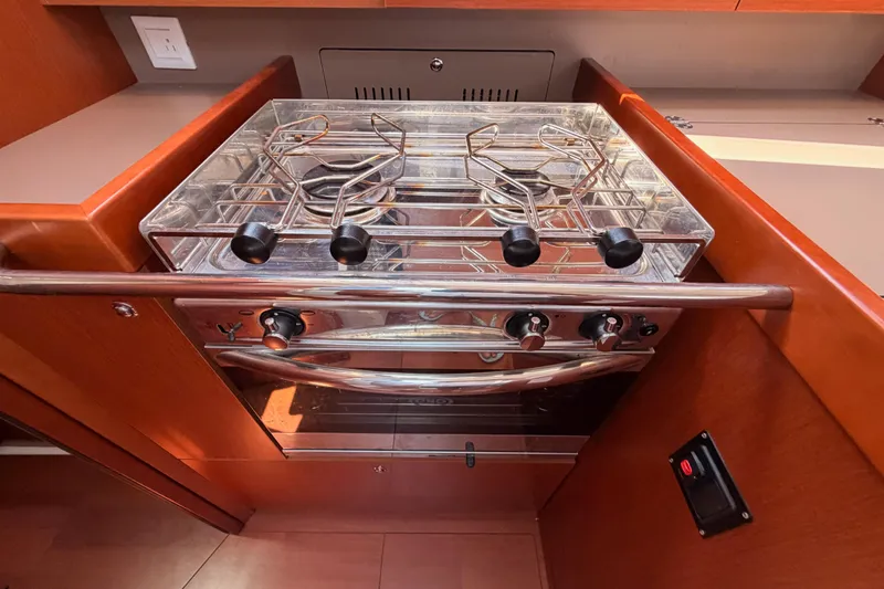 Slide: The Image of Stove and oven in 2018 Beneteau Oceanis 35.1 yacht kitchen. - 42