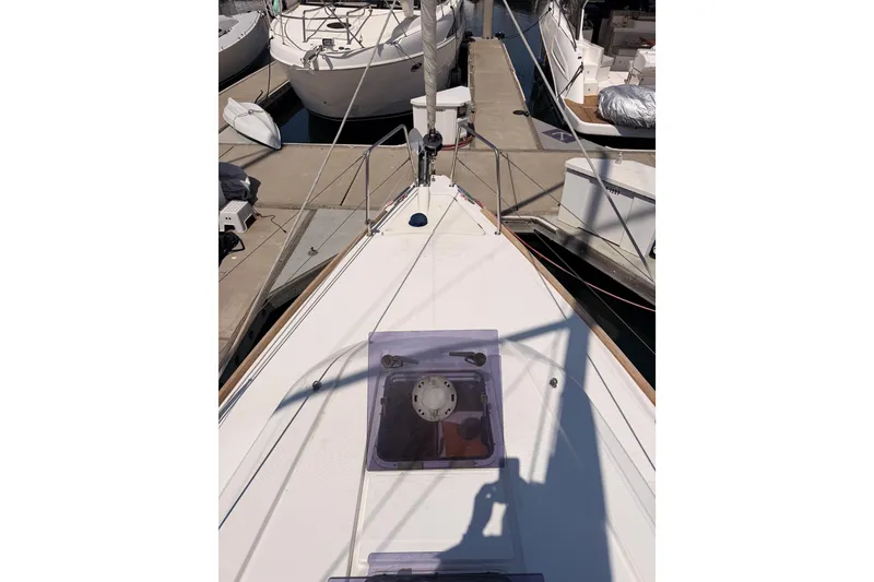 Slide: The Image of 2018 Beneteau Oceanis 35.1 sailboat docked at marina, view from deck. - 12