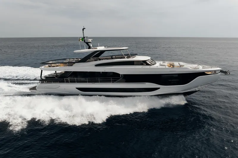 Slide: The Image of The 2027 Azimut Grande 26M speeds across the sea, featuring sleek design and luxurious details. - 6