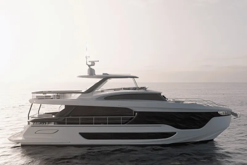 Slide: The Image of The 2027 Azimut Grande 26M is an elegant yacht with a sleek design on calm waters. - 7