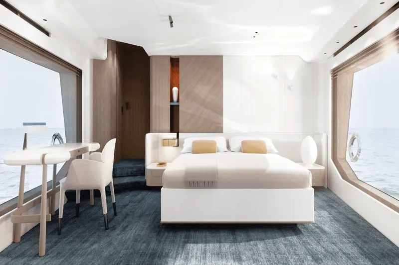 Slide: The Image of Luxurious cabin with a large bed, desk, and big windows overlooking the sea. - 38