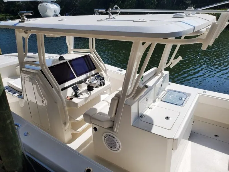 Slide: The Image of A modern boat with a spacious cockpit and two large screens at the helm. - 5