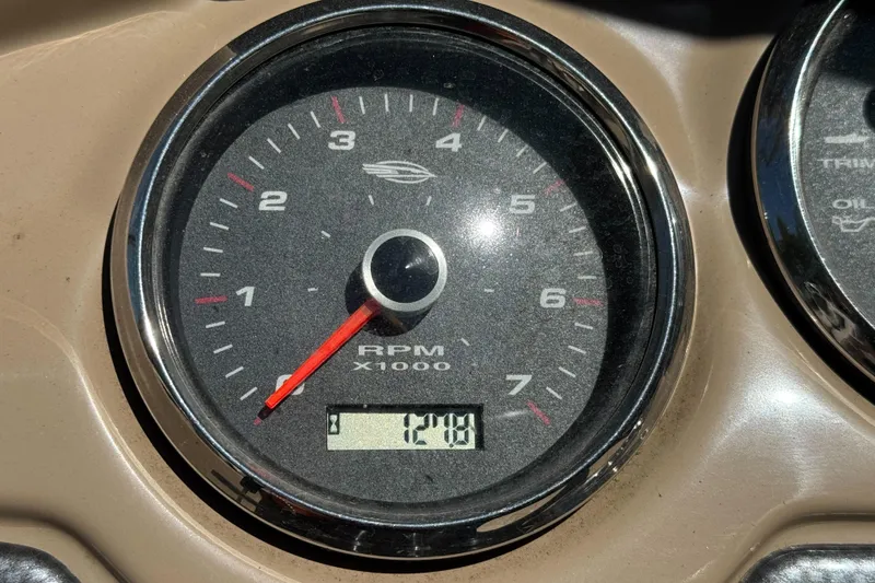 Slide: The Image of Tachometer displaying 1200 RPM on a 2018 Chaparral 19 H2O Ski & Fish boat. - 15
