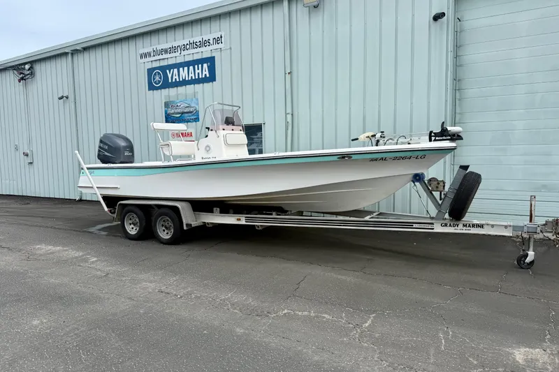 The Image of 2005 BlackJack 224 boat on trailer, parked outside Bluewater Yacht Sales building. - 0