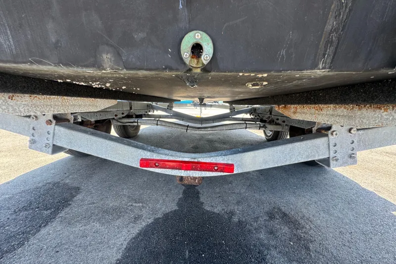 Slide: The Image of Underside view of a 2013 C-Dory 22' Cruiser on a trailer. - 7