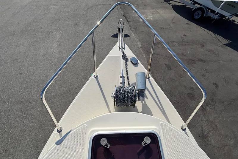 Slide: The Image of The bow of a 2013 C-Dory 22' Cruiser with anchor windlass and chain. - 29
