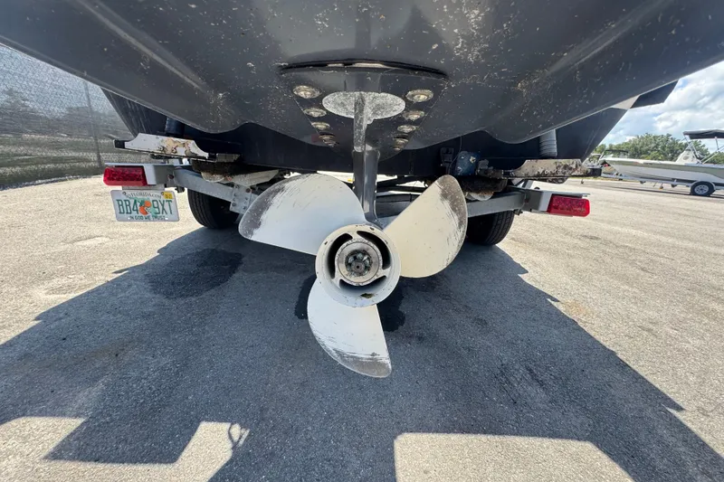 Slide: The Image of Underneath view of a 2013 C-Dory 22' Cruiser boat on a trailer. - 6