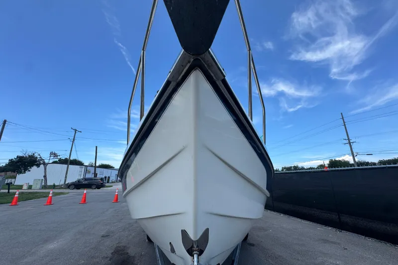 Slide: The Image of 2013 C-Dory 22' Cruiser boat on trailer, blue sky background. - 13