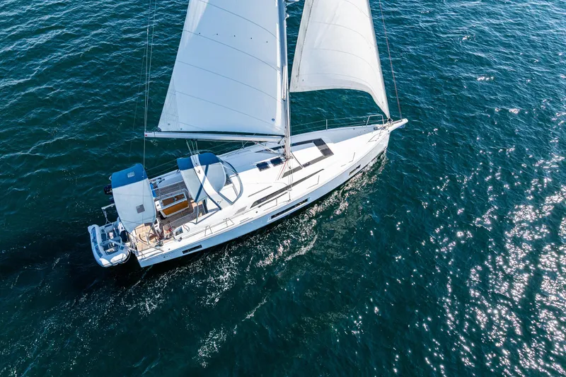 Slide: The Image of Aerial view of 2019 Beneteau Oceanis 46.1 sailing on open water. - 4