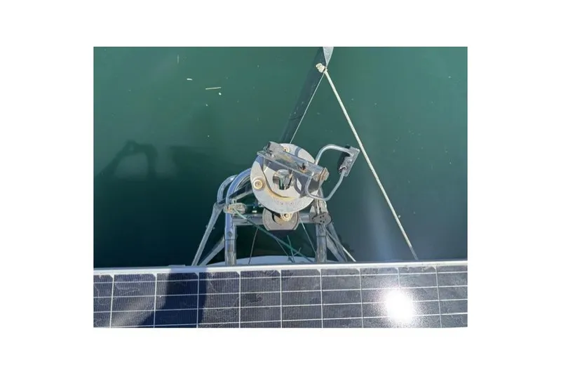 Slide: The Image of Overhead view of a 1990 J Boats J/37 sailboat with solar panels and marine equipment. - 6