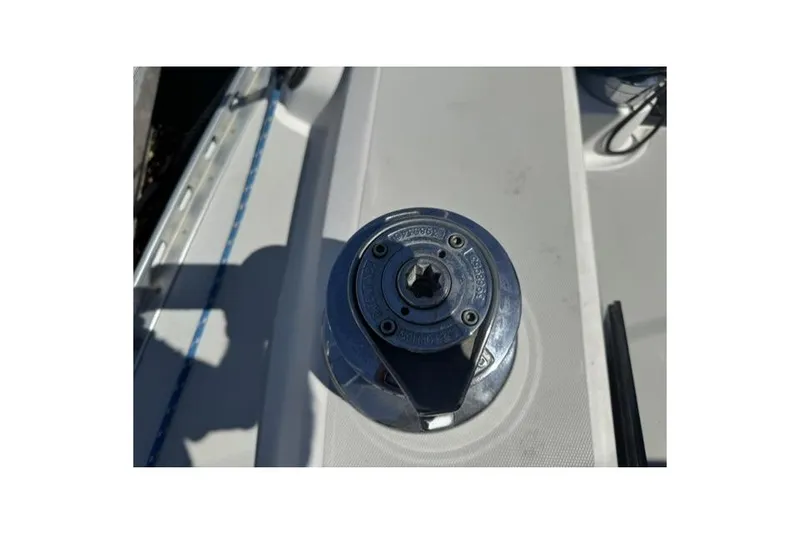 Slide: The Image of Close-up of a winch on a 1990 J Boats J/37 sailboat deck. - 13