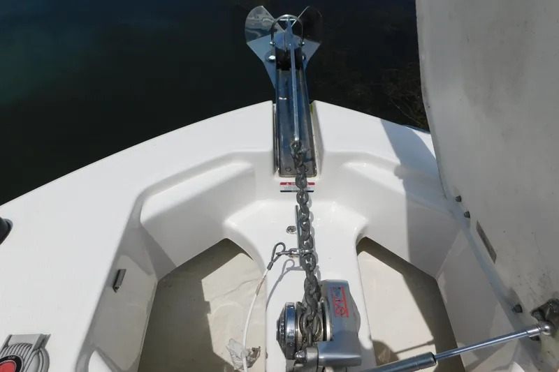 Slide: The Image of 2018 Robalo R247 Dual Console boat anchor system with chain and winch. - 62