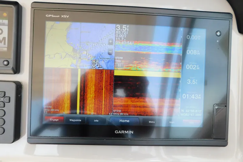 Slide: The Image of Garmin GPSMAP XSV display on 2018 Robalo R247 Dual Console boat dashboard. - 29