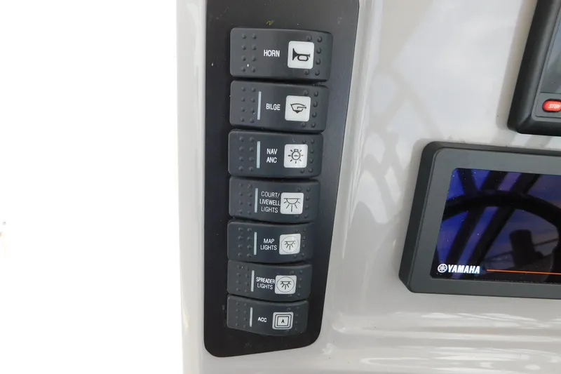 Slide: The Image of Control panel of 2018 Robalo R247 Dual Console boat with Yamaha display. - 42