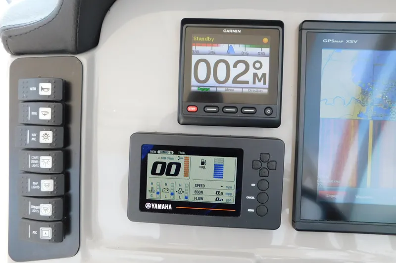 Slide: The Image of Dashboard of 2018 Robalo R247 Dual Console with Garmin and Yamaha displays. - 30