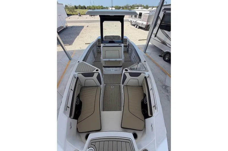 Slide: The Image of 2024 Yamaha Boats 255 FSH Sport H interior with spacious seating and modern design. - 21