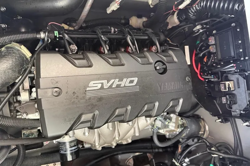 Slide: The Image of Engine compartment of 2024 Yamaha Boats 255 FSH Sport H, featuring SVHO engine. - 28
