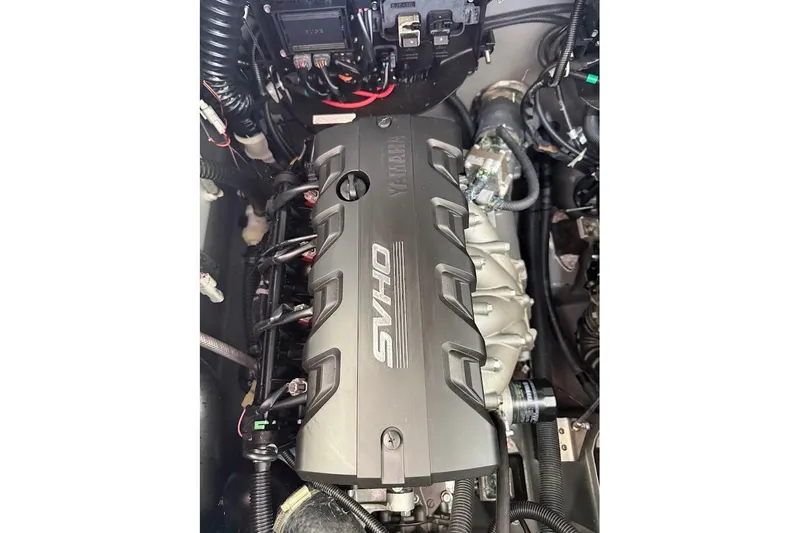 Slide: The Image of 2024 Yamaha Boats 255 FSH Sport H engine, featuring SVHO technology, detailed view. - 29