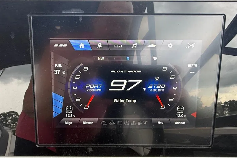 Slide: The Image of Yamaha Boats AR250 2025 dashboard display showing RPM, fuel level, and water temperature. - 22