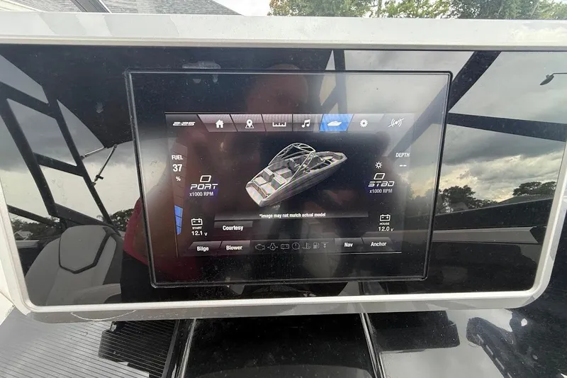 Slide: The Image of Dashboard display of a 2025 Yamaha Boats AR250, showing fuel and system information. - 20