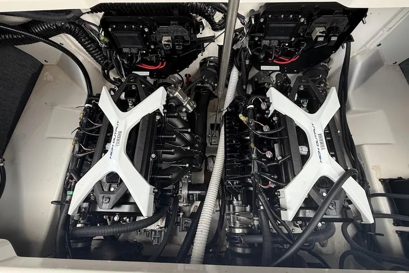 Slide: The Image of 2025 Yamaha Boats AR250 engine compartment showcasing dual high-output engines. - 14