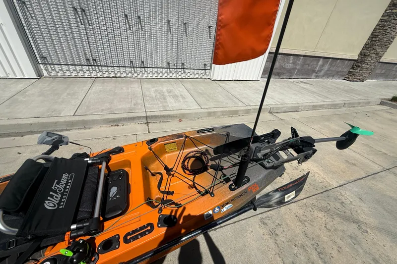 Slide: The Image of Orange OldTown Sportsman PDL 106 kayak with pedal drive system, 2023 model. - 4