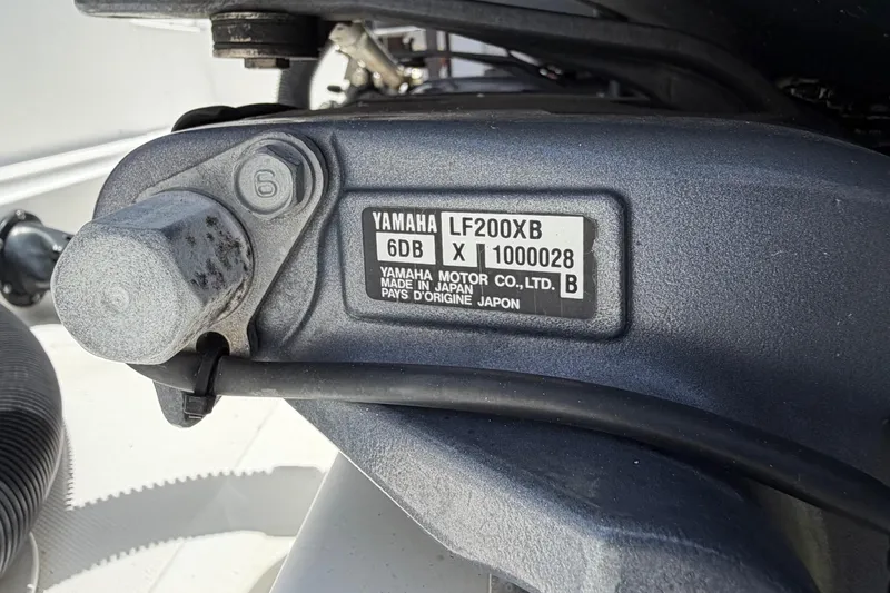 Slide: The Image of Close-up of Yamaha LF200XB engine part on 2001 Stamas 270 Express boat. - 15