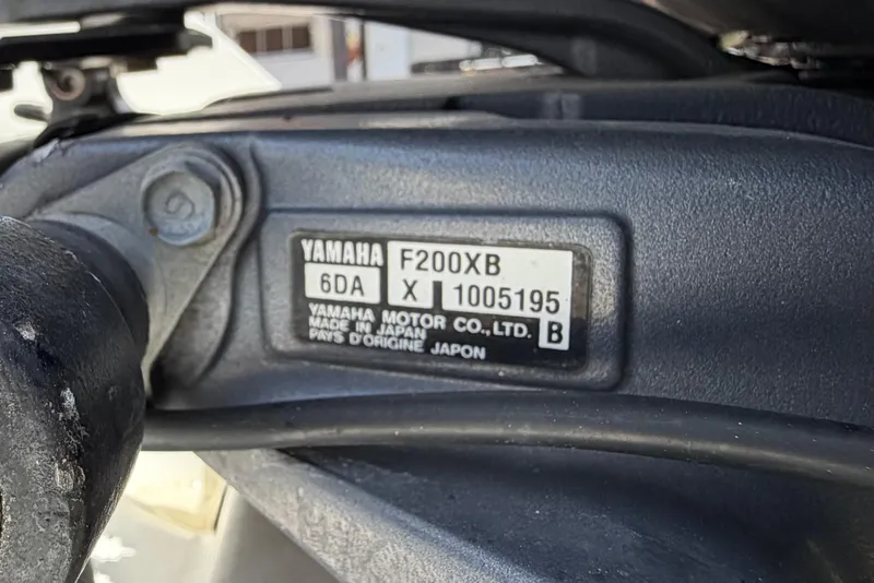 Slide: The Image of Yamaha F200XB engine label on a 2001 Stamas 270 Express boat. - 14