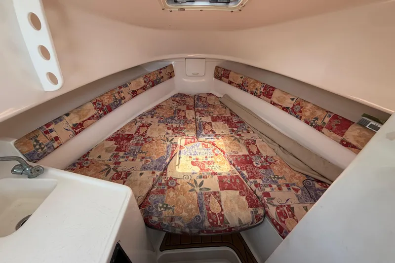 Slide: The Image of 2001 Stamas 270 Express cabin interior with patterned cushions and compact sink. - 38