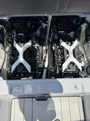 Slide: The Image of The engine compartment of a 2026 Yamaha Boats 252XE features two powerful engines. - 7