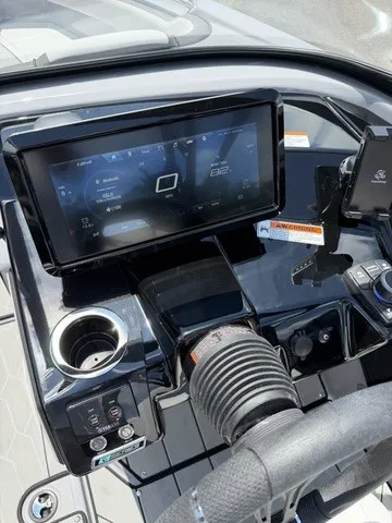 Slide: The Image of The image shows the dashboard of a Yamaha 252XE boat with a large display and controls. - 8