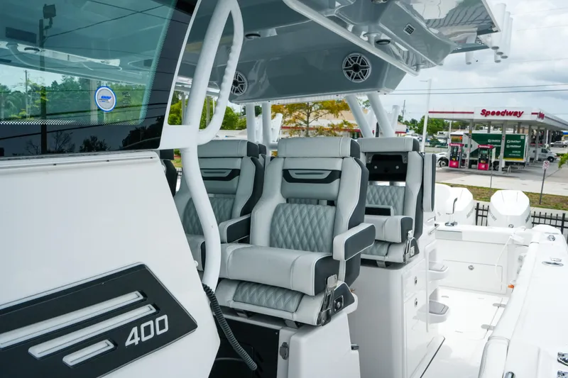 Slide: The Image of 2025 Blackfin 400 CC boat interior with luxurious seating and modern design. - 25