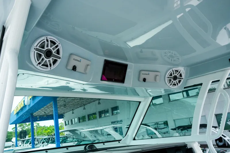 Slide: The Image of Interior view of 2025 Blackfin 400 CC boat with Garmin electronics and speakers. - 18