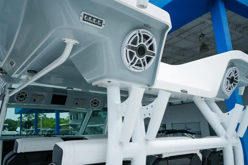 Slide: The Image of 2025 Blackfin 400 CC boat interior with speakers and modern design elements. - 13